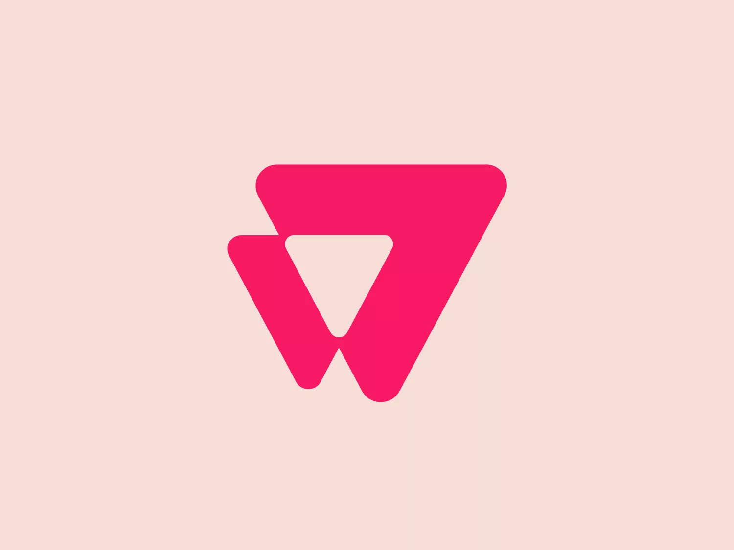The VTEX logo is a vibrant pink or magenta stylized letter "W" composed of three overlapped shapes. The design consists of an upright isosceles triangle on the right, with its base aligned at the center, and two right-angled triangles on the left mirroring each other, forming the distinctive "W" shape. The overall aesthetic is modern and minimalist, with a dynamic feel due to the overlapping elements implying motion or layering. The logo's simplicity and bold color choice give it a striking and easily recognizable appearance.