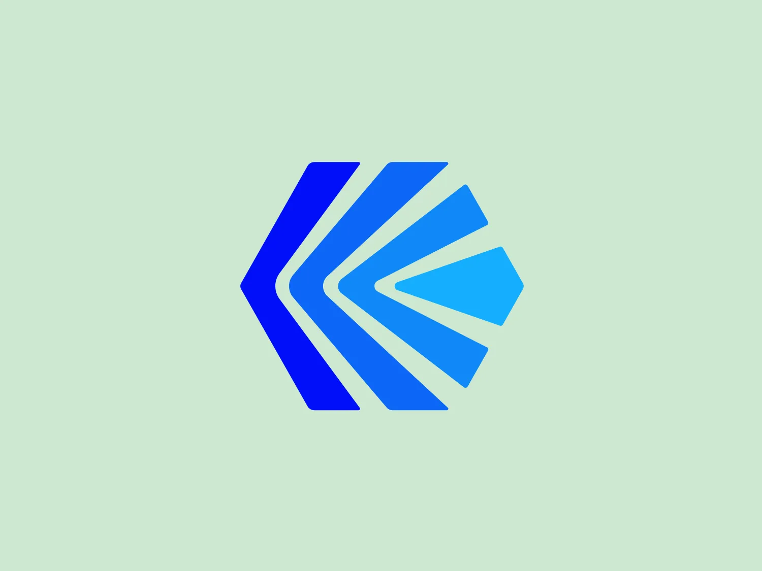 The Kwikbit logo is a stylized, abstract shape resembling a geometric form with angular turns and overlapping elements. It consists of several shades of blue, ranging from lighter to darker tones, creating a gradient effect that adds dimension and a dynamic feel to the design. The shapes form an arrow-like figure pointing towards the left, suggesting movement or direction. The logo has a modern and digital feel, implying technology or progressiveness. The angular cuts and the play with negative space give it a forward-thinking aesthetic.