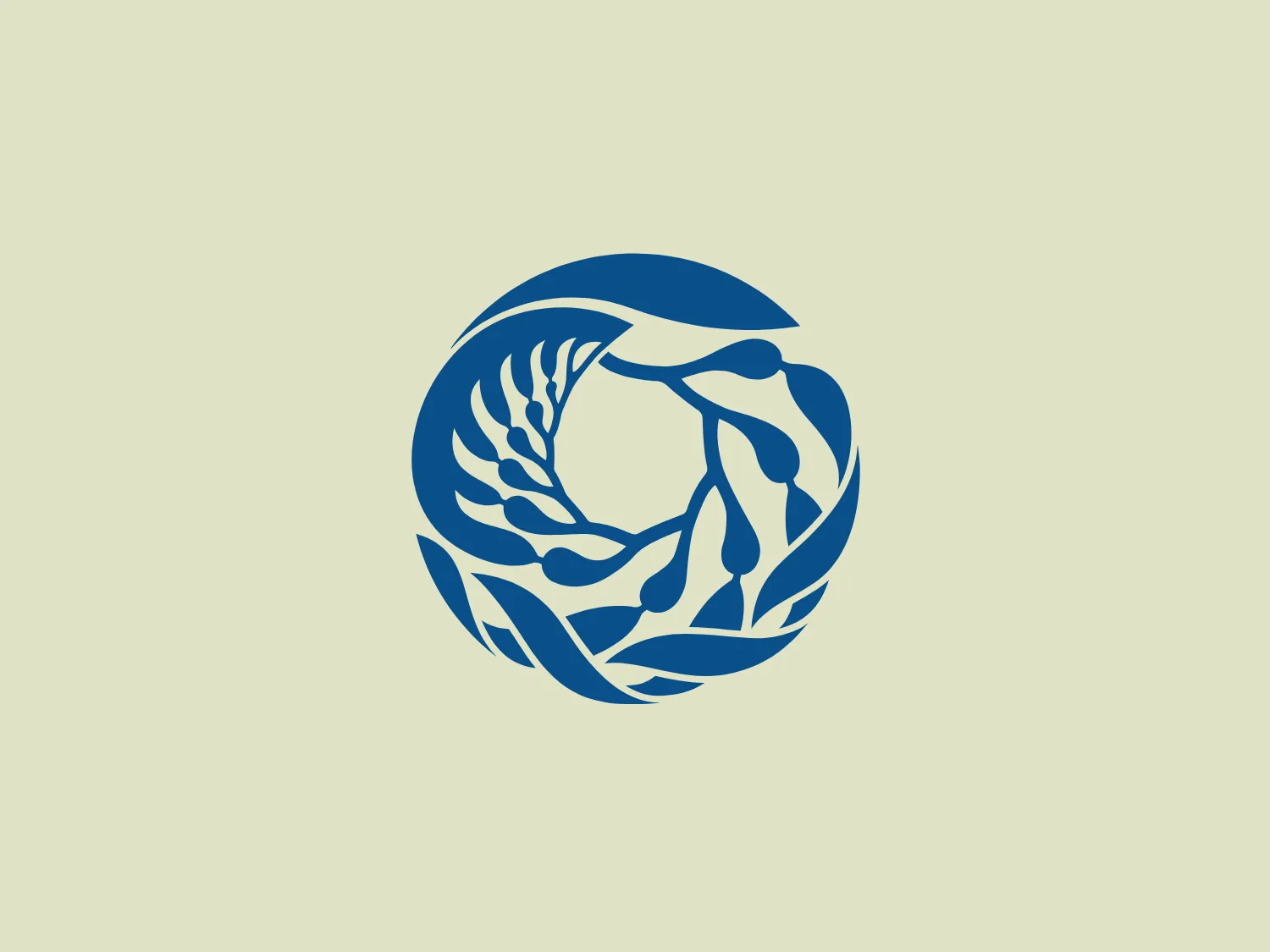 The Monterey Bay Aquarium logo features a circular design comprised of stylized elements that resemble both foliage and flowing water, creating a sense of harmony and balance. Central to the design is a negative space circle that focuses the viewer's attention. The interplay of shapes suggests connectivity and natural synergy. The logo is monochromatic, utilizing a shade of blue, which conveys calmness, trust, and professionalism. It possesses an organic and dynamic aesthetic, with the various elements weaving together seamlessly, embodying fluidity and growth.